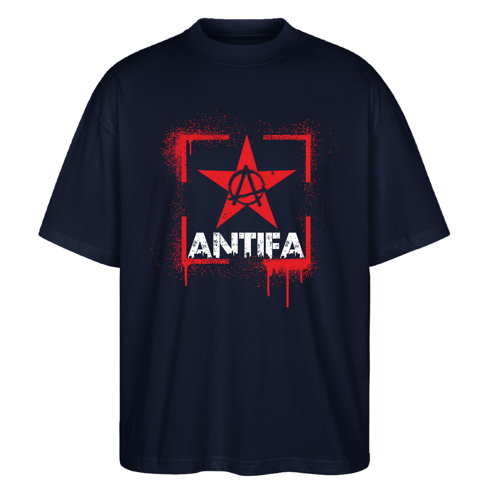 Navy unisex T‑shirt front graphic: red spray‑paint rectangular border with a central red star enclosing an encircled A (anarchist symbol) above large distressed white “ANTIFA” lettering; organic cotton, high‑contrast protest design.