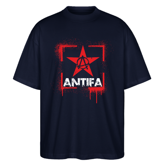Navy unisex T‑shirt front graphic: red spray‑paint rectangular border with a central red star enclosing an encircled A (anarchist symbol) above large distressed white “ANTIFA” lettering; organic cotton, high‑contrast protest design.