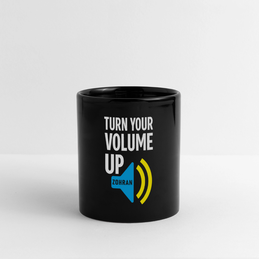 Black ceramic mug with TURN YOUR VOLUME UP print, blue ZDRAM speech bubble, and yellow sound waves